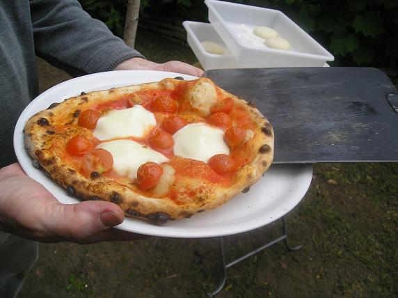 Pizza con 2 minutos y medio de cocción a casi 400º.
