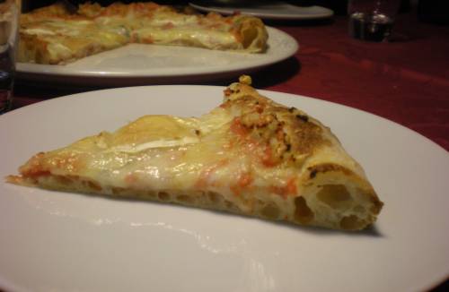corte pizza 4 quesos.jpg